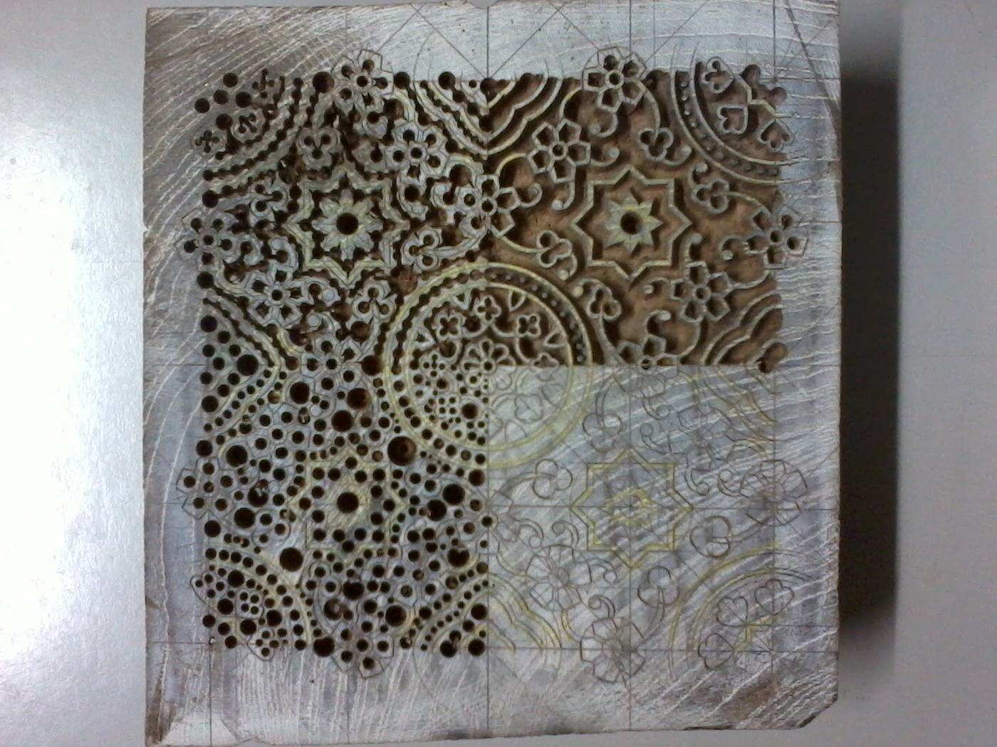 Carved wooden Ajrakh printing block