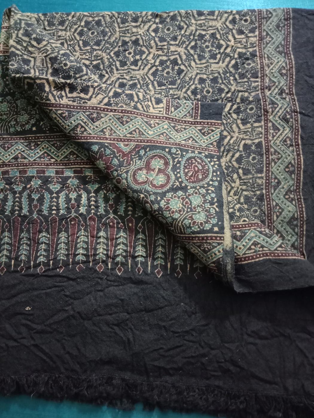 Folded Ajrakh printed textile