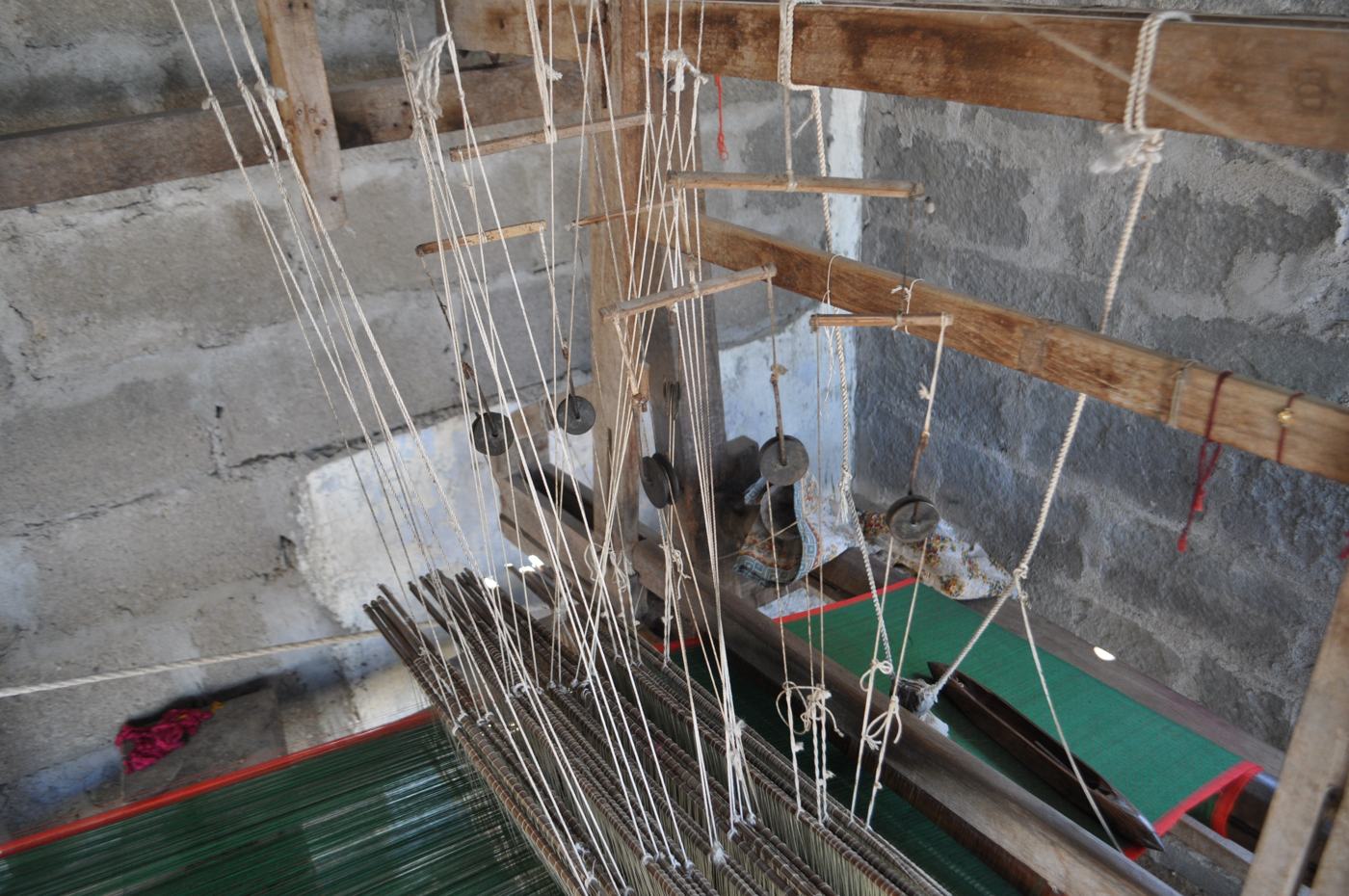 Inside a mashroo loom with many heddle shafts